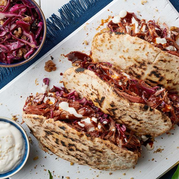 PULLED PORK PITTAS WITH RED CABBAGE SALAD YOGHURT DRESSING