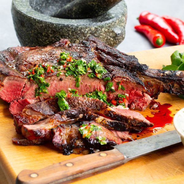 REVERSE-SEARED BBQ TOMAHAWK STEAK WITH CHIMICHURRI