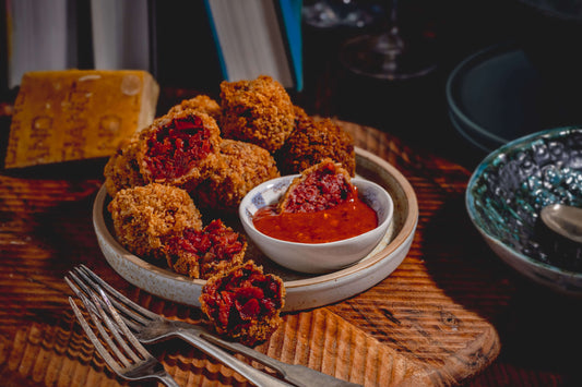 Black pudding and beetroot arancini balls with chilli jelly