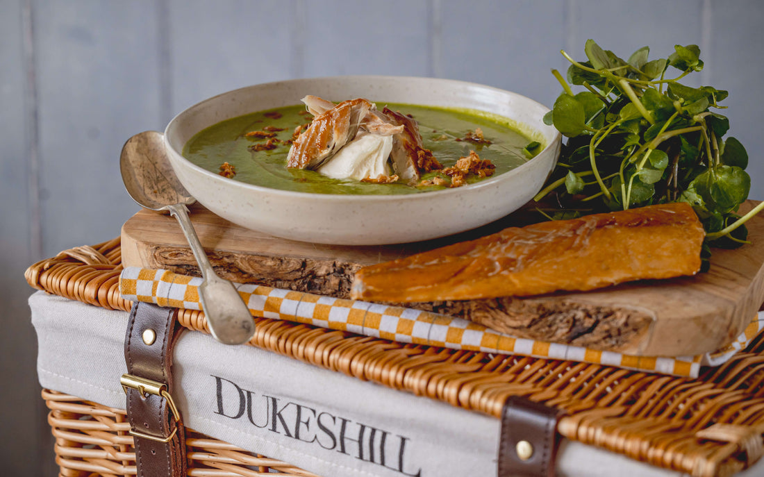 mackerel and salmon soup on chopping board and wicker basket