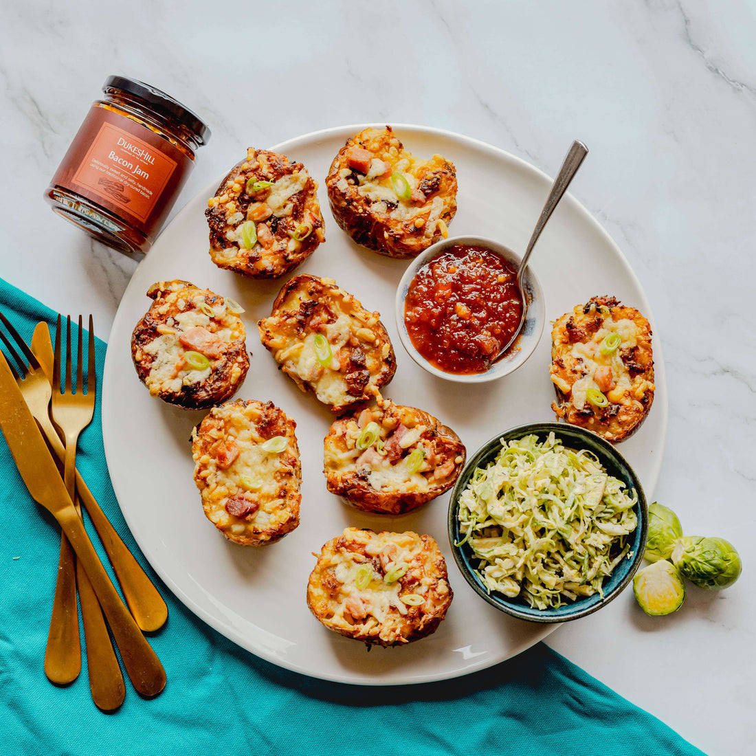 Twice baked potatoes with ham and Brussels sprout slaw