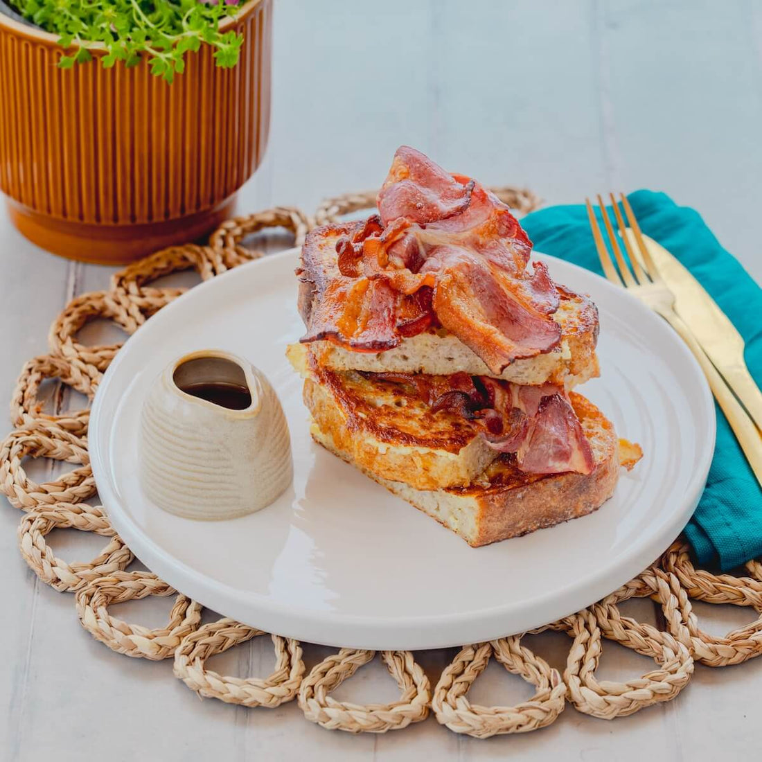 French toast with crispy bacon and maple syrup