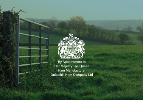 royal warrant logo on top of image of field