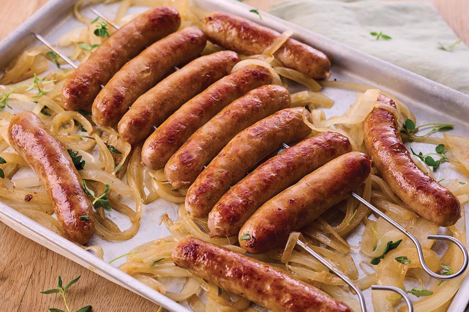 12x DukesHill Traditional Pork Chipolatas on an oven tray